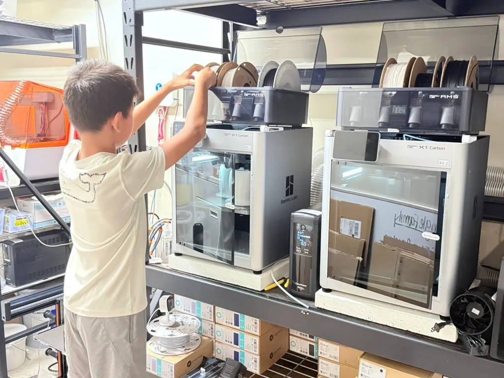 Student working with Bambu Lab X1 Carbon FDM printers at FutureForward